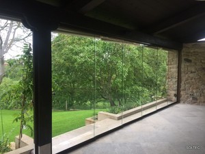 Instalacion de cortina de cristal sin perfiles verticales