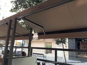 Terraza con toldo a un agua